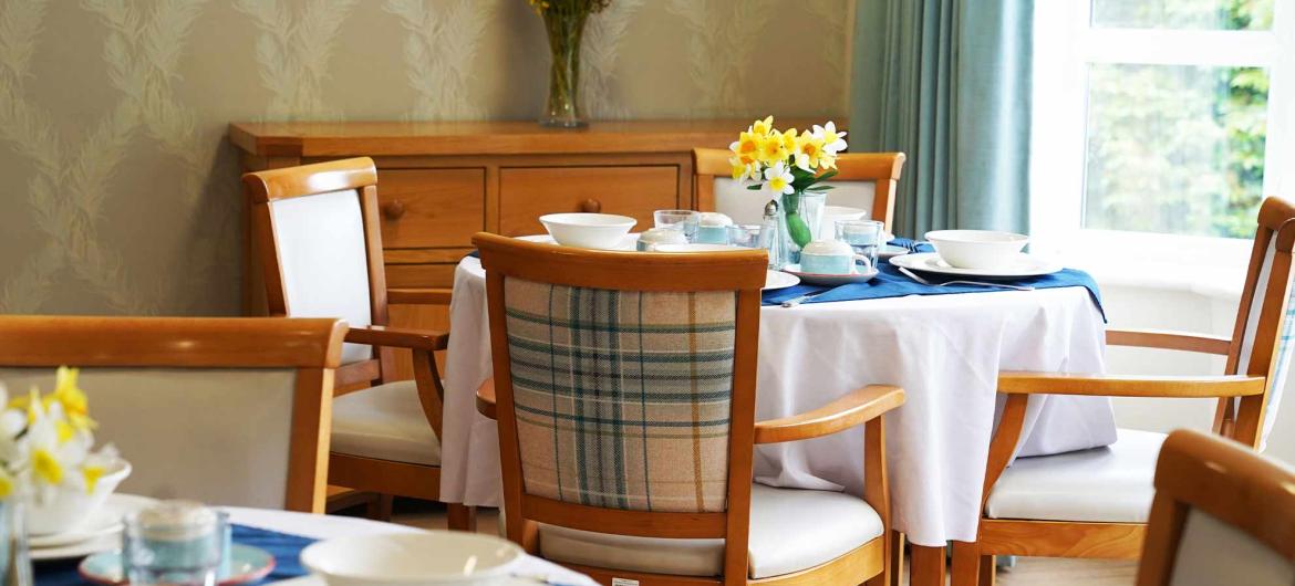 Interior of dining area at Brambles Residential Care Home