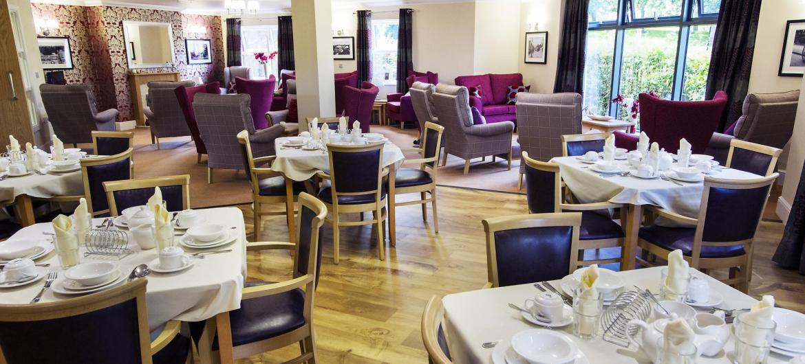 The dining room tables at Lake View Residential Care Home set for dinner.