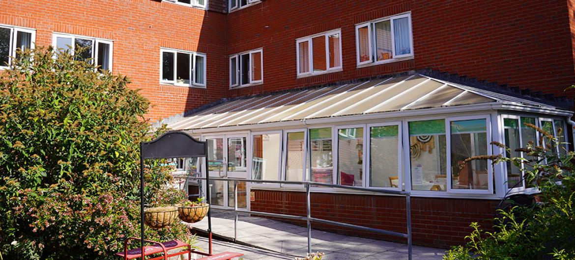 Sunny conservatory at Fernihurst Nursing Home in Devon