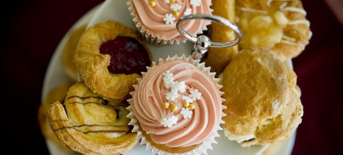 A cake stand full of delicious home-made cakes.