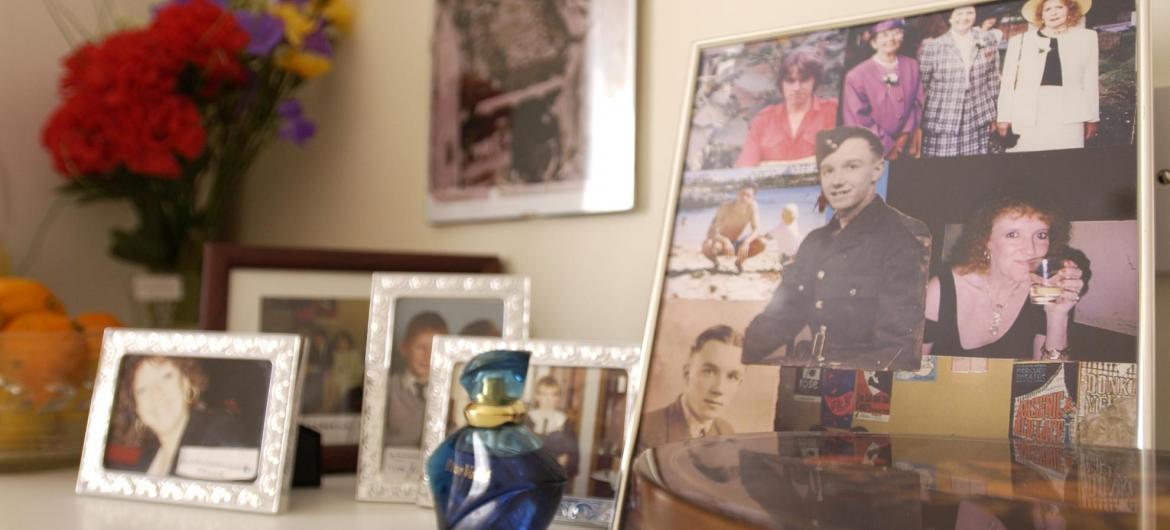 Family photos in a residents room.