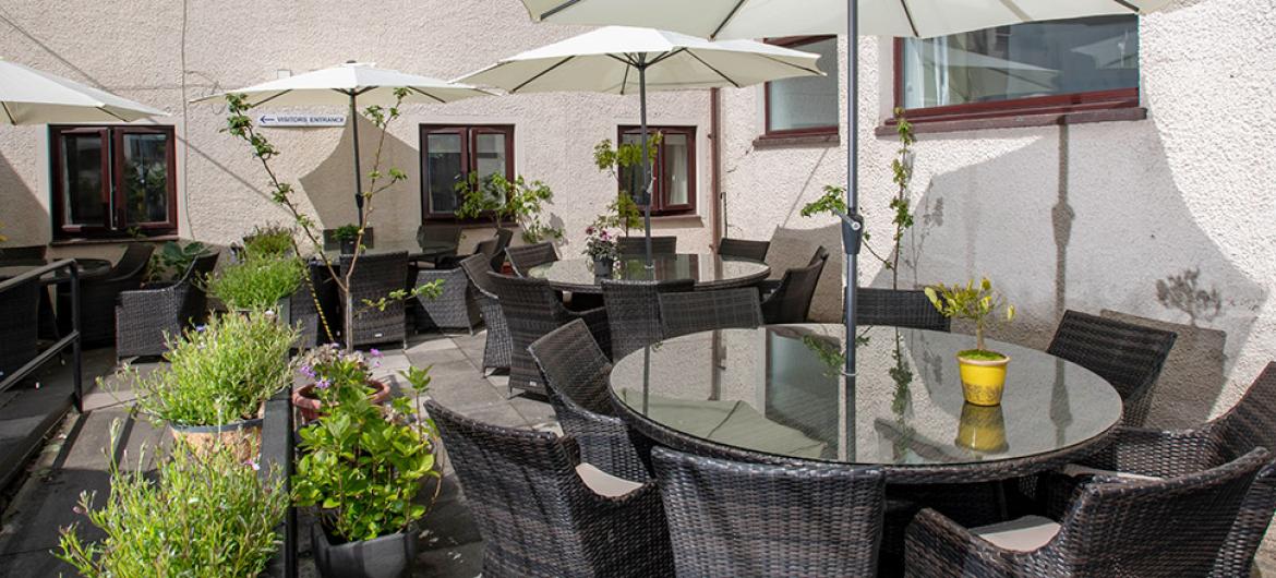 Garden seating area at Millport Care Centre in Ayrshire
