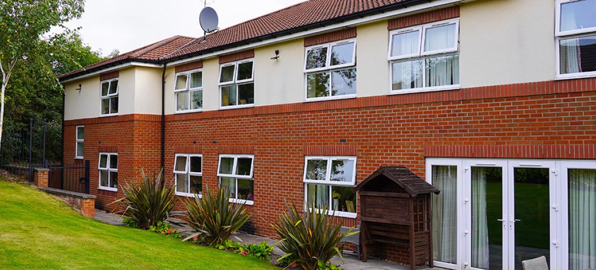 The Beeches Care Home exterior and gardens