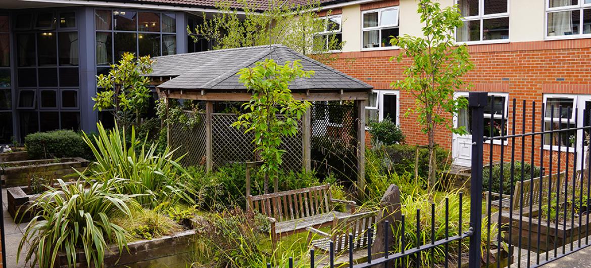 The Beeches Care Home garden patio area