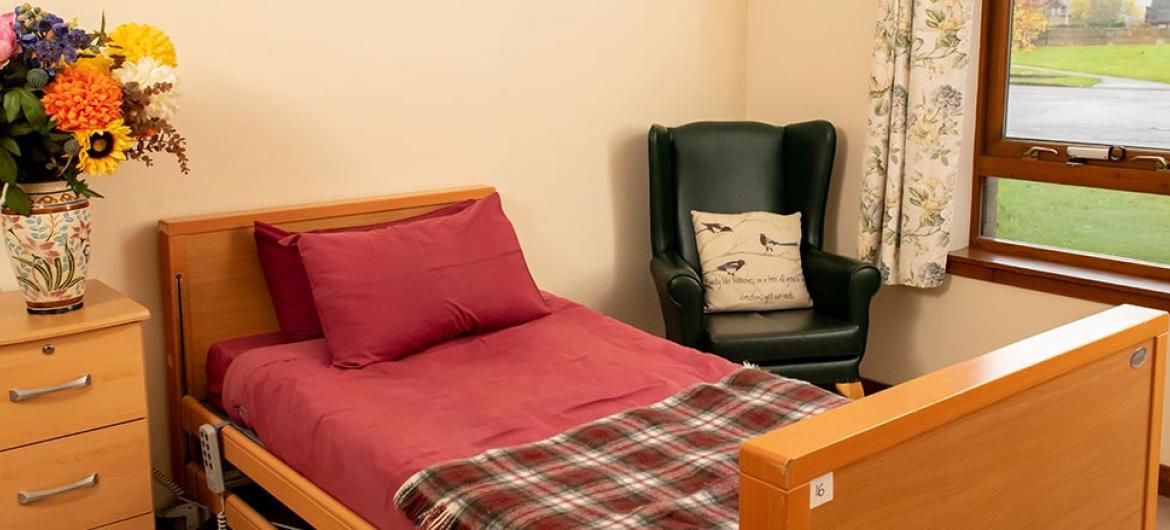 Beautiful bedroom with garden views at The Meadows Care Home in Dornoch