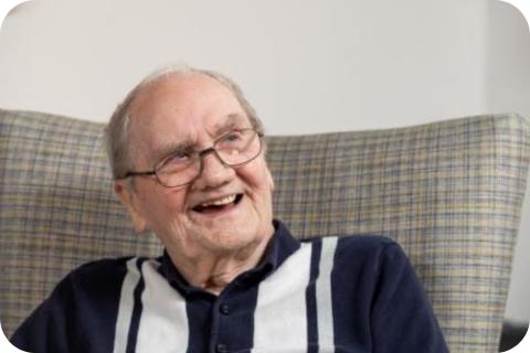 A male resident smiling