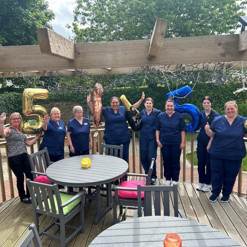 Howard House's glowing 'Very Good' rating The team at Howard House with balloons to celebrate the home's recent 'Very Good' Care Inspectorate rating