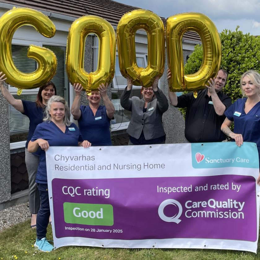 The team at Chyvarhas celebrate their Good CQC report, pictured with balloons outside the home