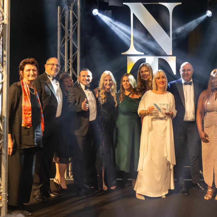 Sanctuary staff smile for the cameras with their Nursing Times Awards