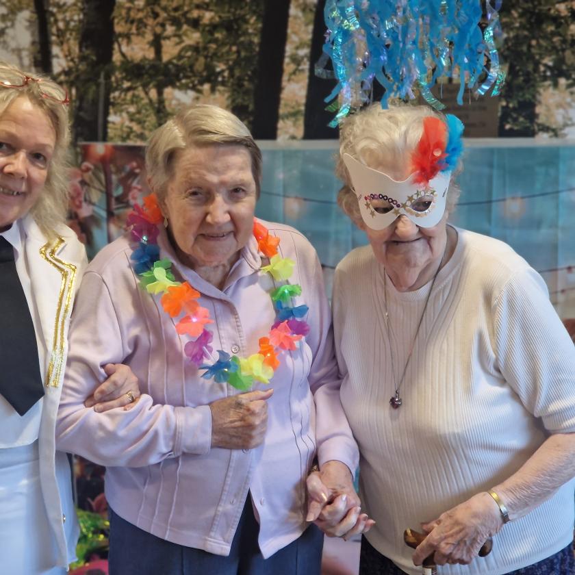 Staff and residents stood together smiling
