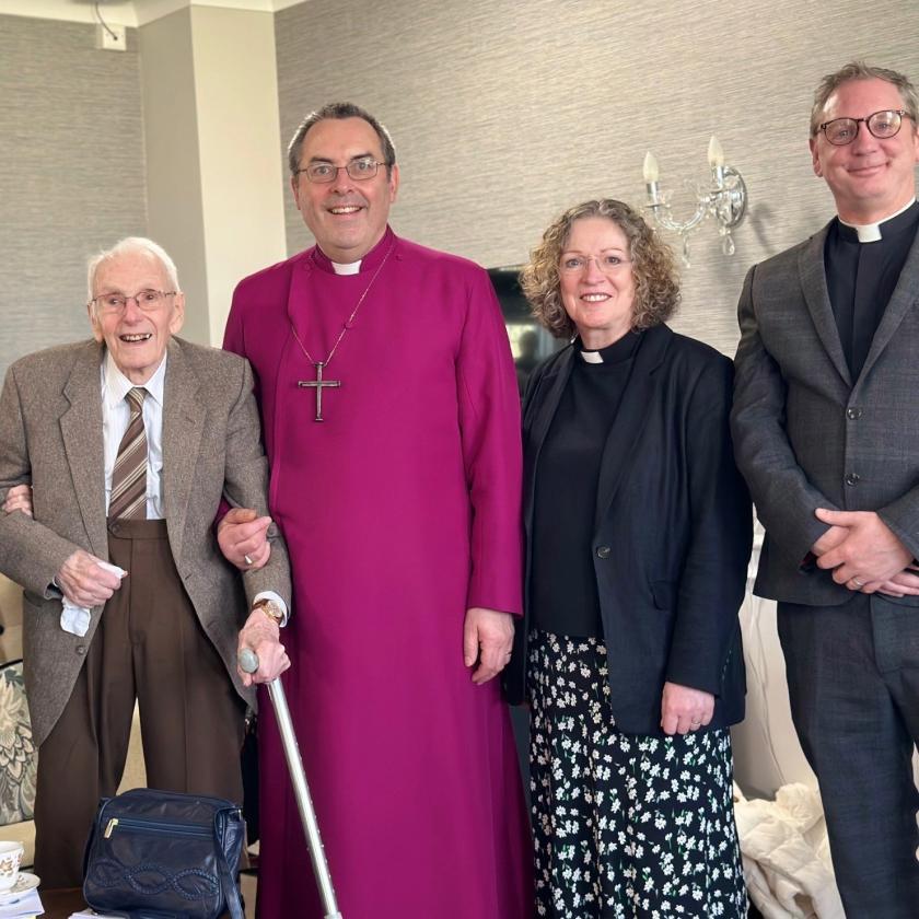 Staff stood reverend smiling