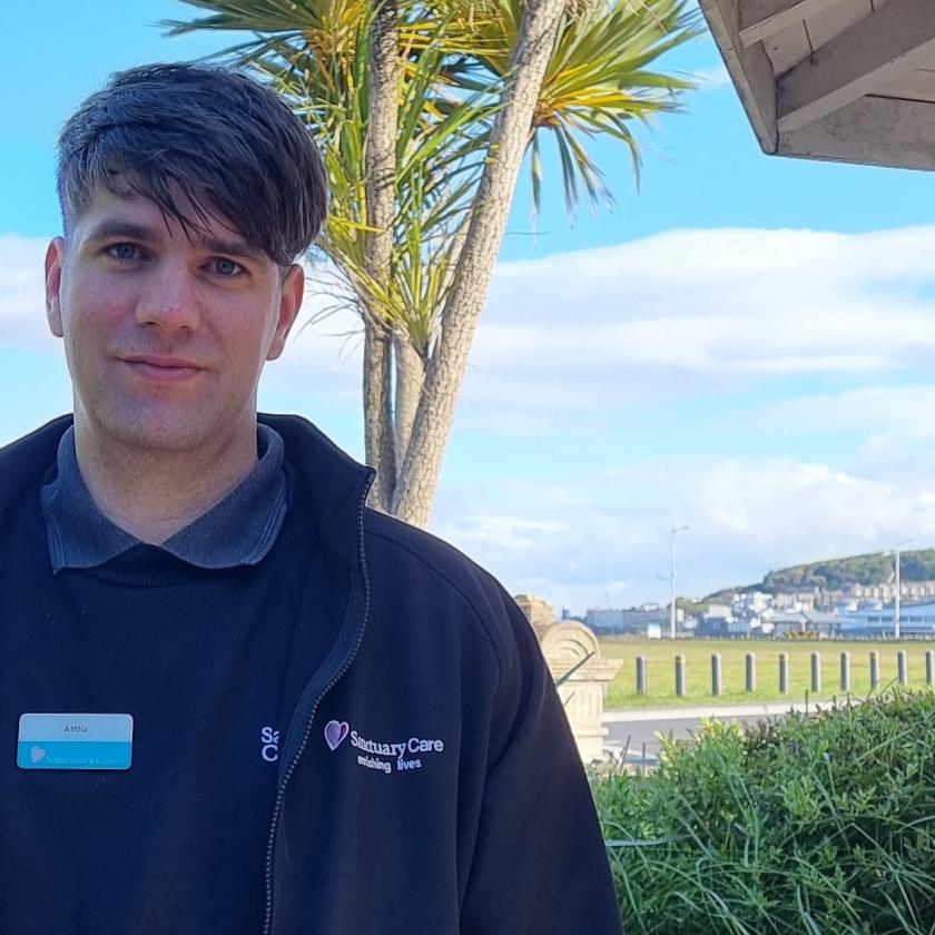 Staff member smiling