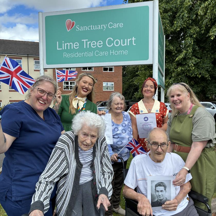 Residents and staff celebrating