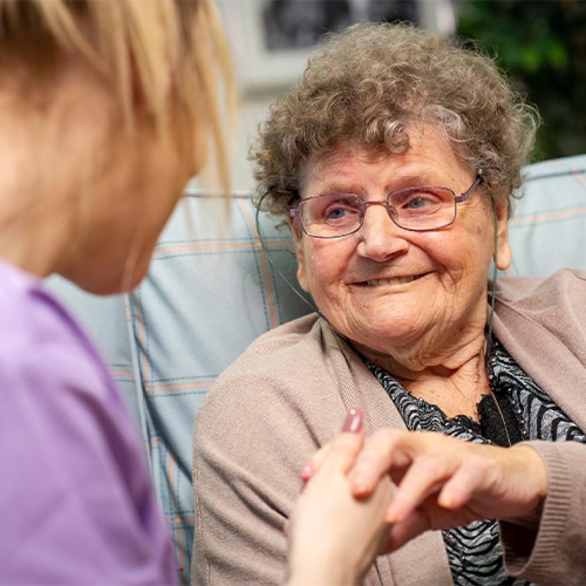 Sanctuary Care resident talking to staff