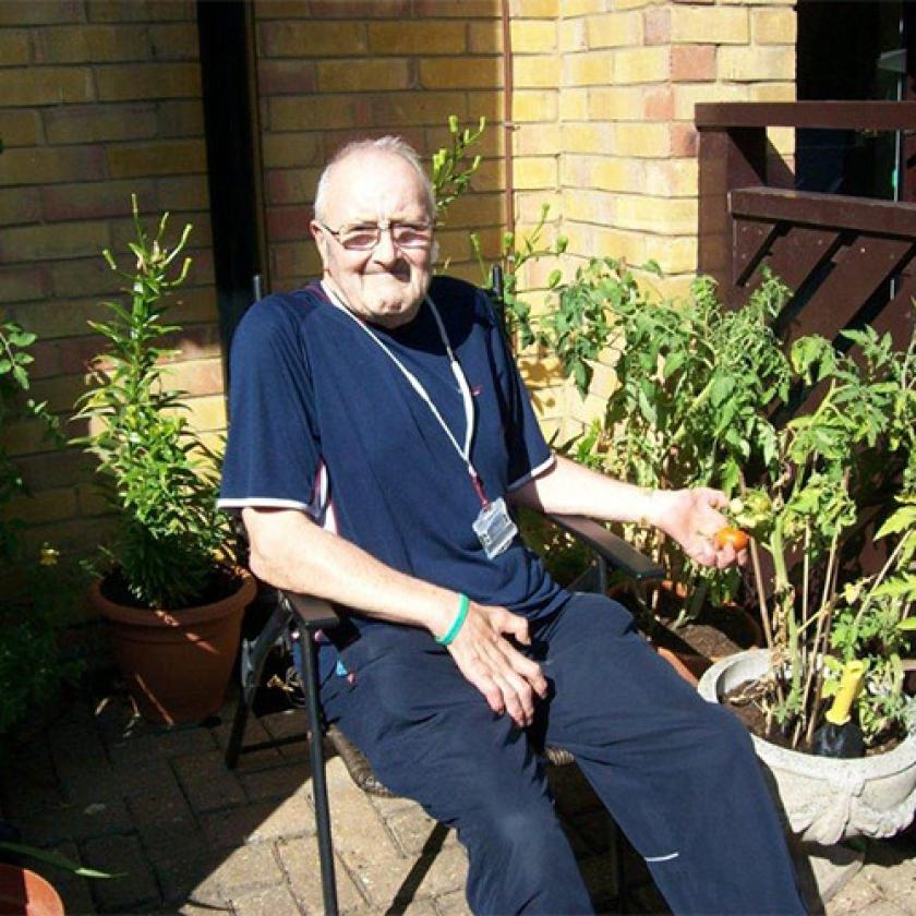Shaftesbury Court resident sitting in the garden